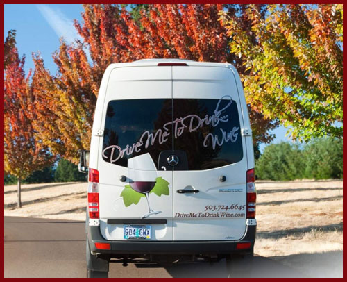 Drive Me to Drink Wine wine tour van: A Mercedes luxury sprinter driving through a vineyard.
