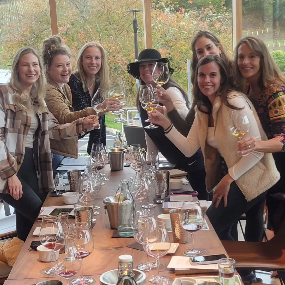 Group enjoying a private wine tasting at a Willamette Valley winery